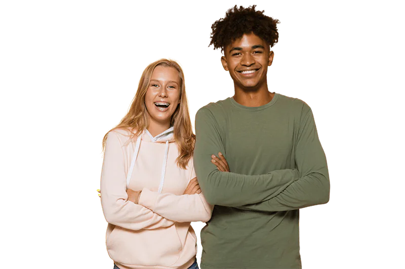 Two smiling teenagers, one wearing braces